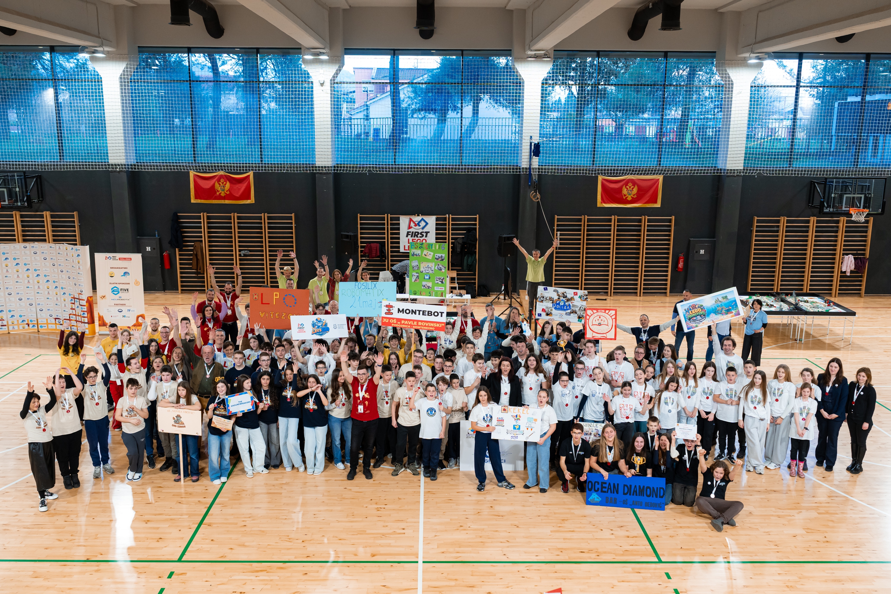 Participants, mentors, volunteers and organisers in a group photo at the national FIRST LEGO League Challenge competition in Montenegro